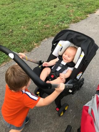 Doona Car Seat Review: older kids pushing