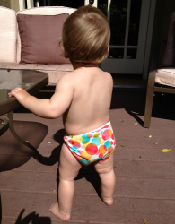 Alice in her Bummis Swimmi swim diaper